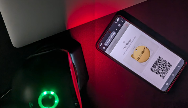 Guest using the laser engraving web app on their phone to design a keepsake with QR code